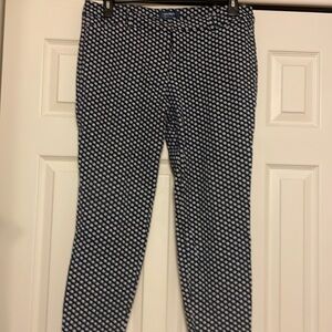 Old Navy blue, with white “flowers.”  They are very stretchy and comfy.